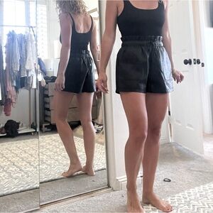 Black foe, leather shorts